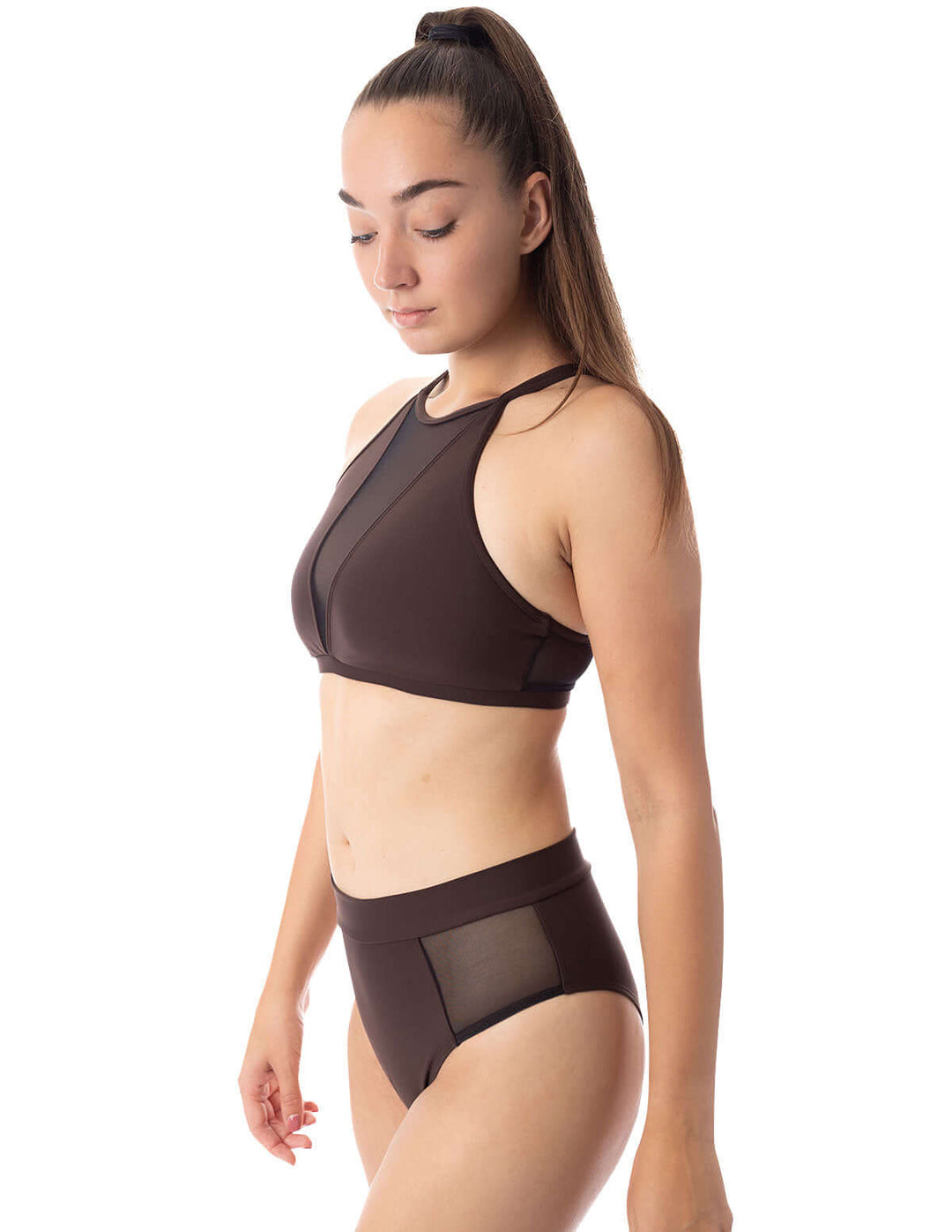 Model wearing Mesh pole shorts Molly with matching crop top in brown, showcasing stylish design and comfort.